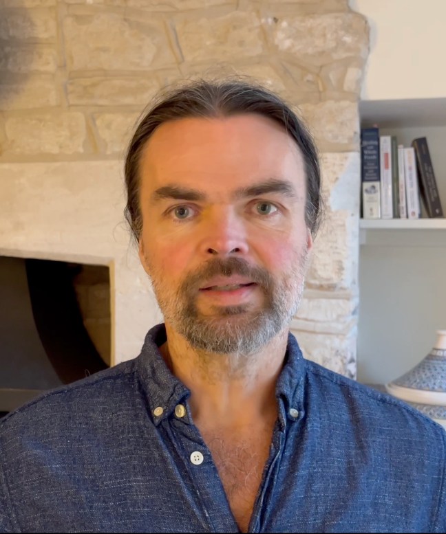 Portrait of Dr. Tallis Barker, international water fasting coach and Oxford-educated naturopath, author of waterfasting.org